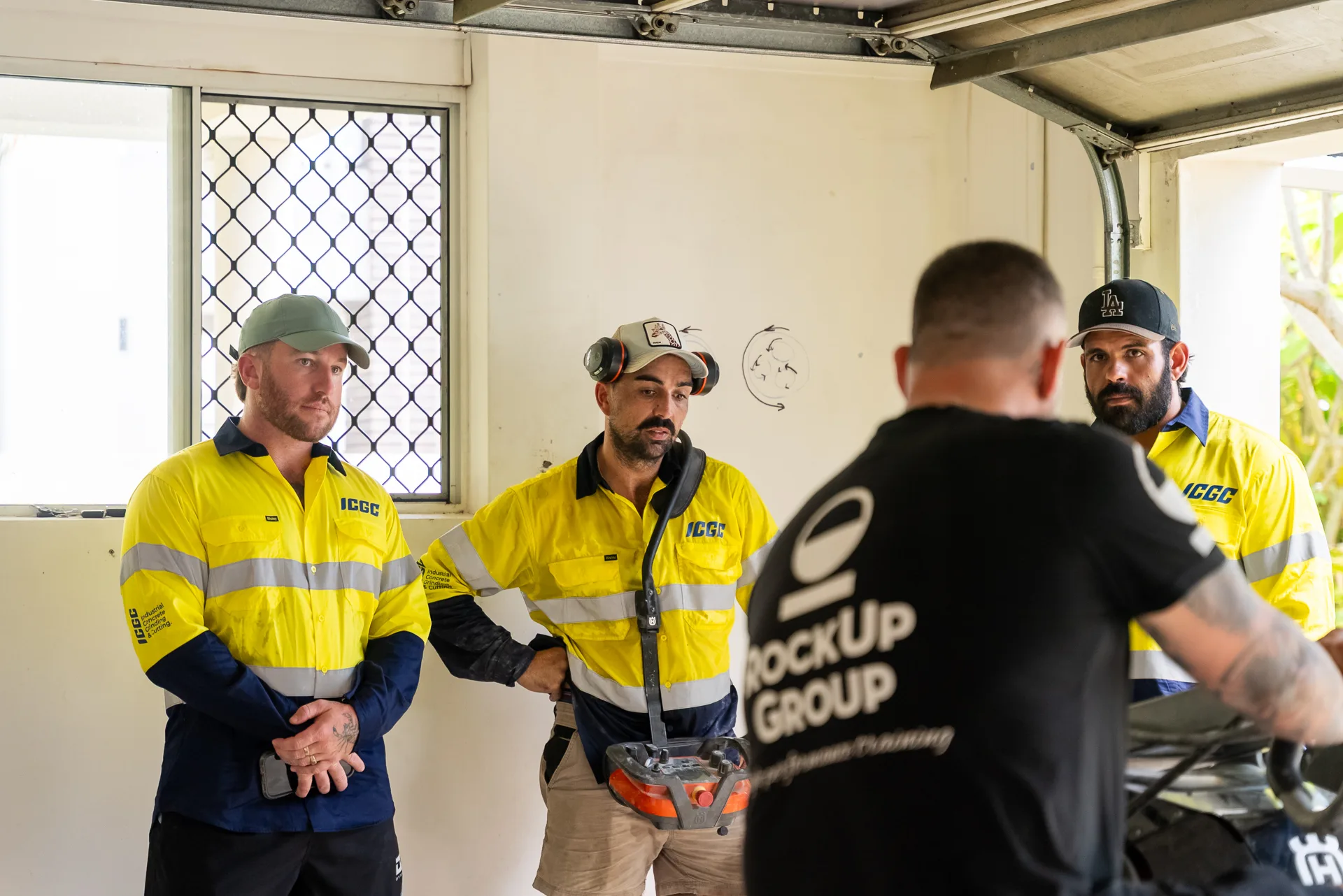 ICGC team members working with Husqvarna equipment during training day